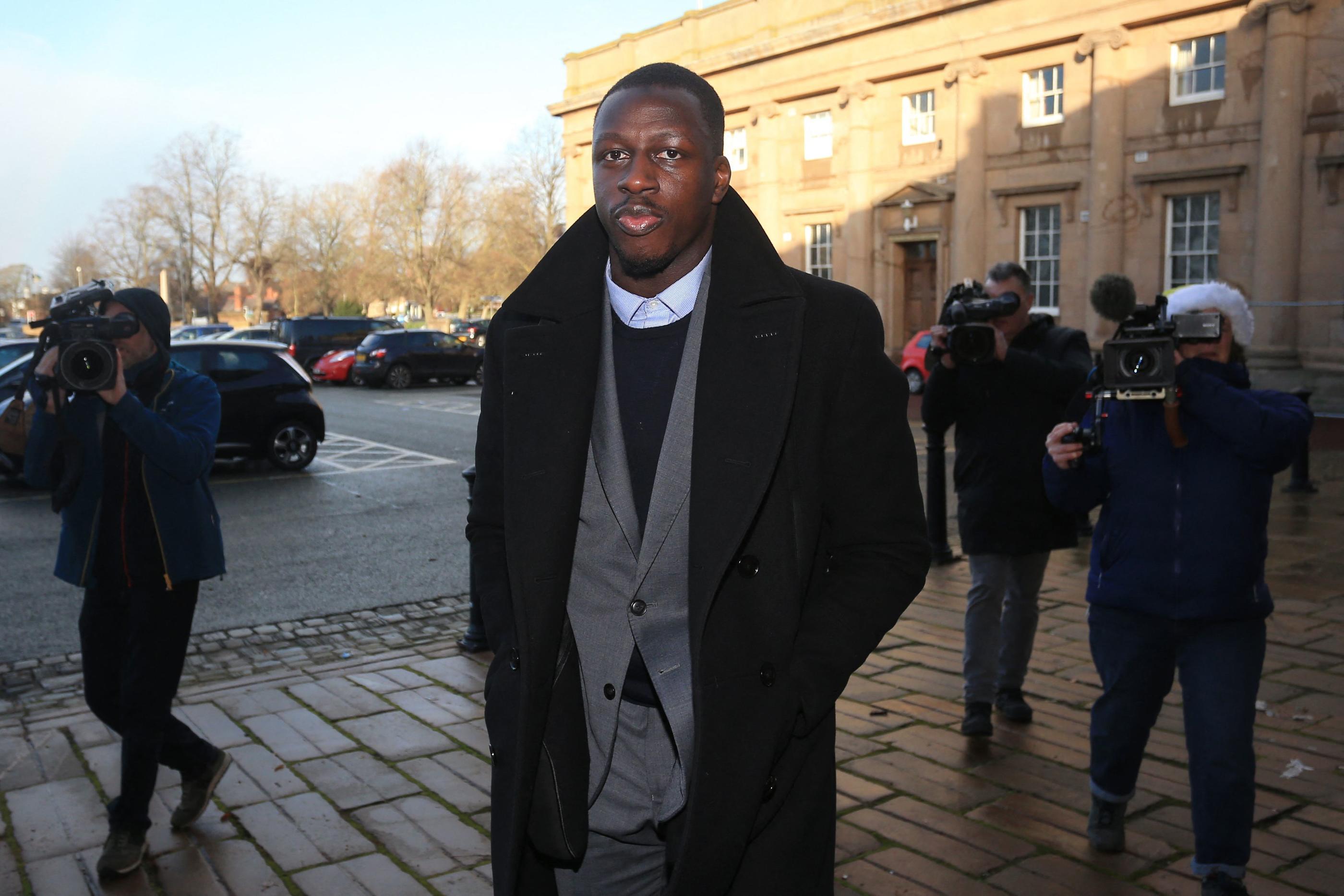 Manchester City and France footballer Benjamin Mendy arrives at Chester Crown Court in Chester, northwest England, on December 20, 2022. - A jury resumed its deliberations yesterday in the rape and sexual assault trial of Mendy, 28, who has been on trial since August and denies seven counts of rape, one of attempted rape, and another of sexual assault, against six women. (Photo by Lindsey Parnaby / AFP)